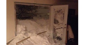 snow-destroys-door-buffalo