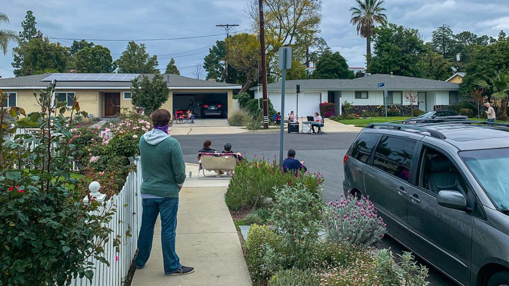 Adam Chester performs for neighborhood