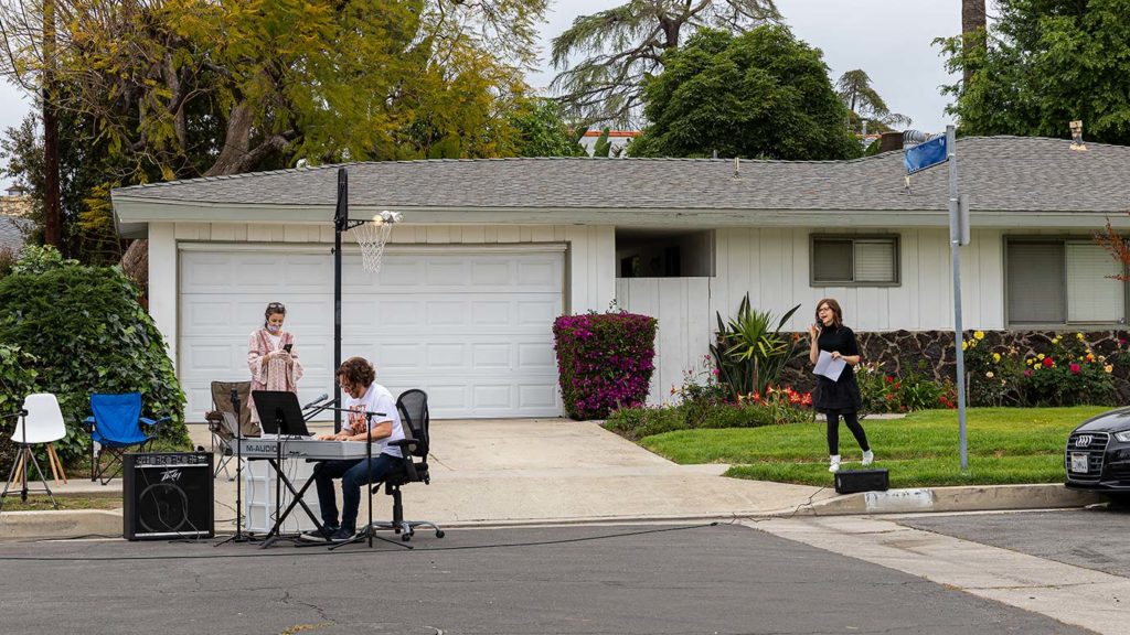 Adam Chester performs with Lisa Lobe for neighborhood