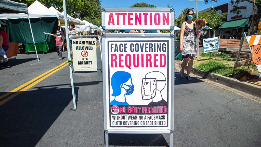 facial covering sign at Montrose farmers market